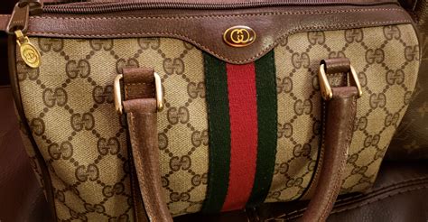 how do you tell a real gucci purse|Gucci purse real.